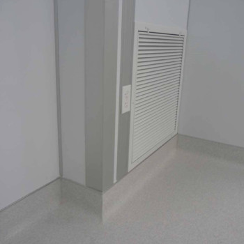 gray heat welded vinyl floor, integral cove, cleanroom air return, cleanroom electrical outlet