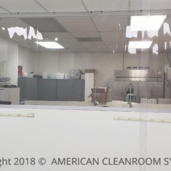 ponywall in lab space, clear cleanroom vinyl divider wall