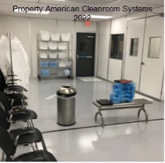 cleanroom gowning room interior, gown rack, stainless steel bench, storage racks