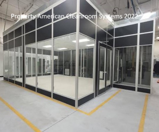 Black industrial cleanroom exterior, floor to ceiling cleanroom windows