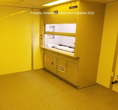 Interior class 1000 cleanroom, heat welded vinyl flooring, cleanroom fume hood, amber cleanroom lighting