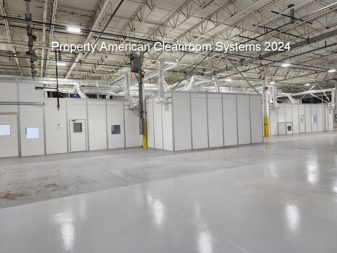 5000 square foot cleanroom, white modular walls, inside large warehouse, side view