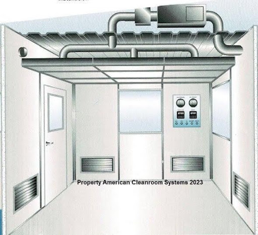 interior of class 1000 modular cleanroom, amber lighting, cleanroom doors, low wall air return
